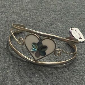 Alpaca Mexico ‘Mexican Silver’, silver-tone cuff with shell inlay.